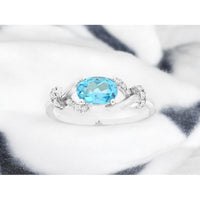 14K White Gold Blue Topaz & Diamond Ring with Oval Blue Topaz and Diamond Accents - 1.05 Carats Total Gem Weight