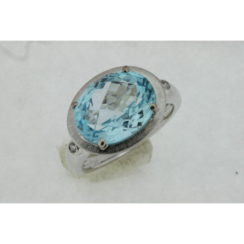 14K White Gold Brushed Setting Oval Blue Topaz Ring with Round Diamond Accents - 6.75 Carat Blue Topaz and 0.03 Carat Total Diamond Weight - Royal Jewelry