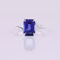 14K White Gold Bypass Ring with 3.59 Carat Emerald Cut Blue Lab Sapphire and 0.24 Carat Round Lab Diamond Accents - Total 3.88 Carats - Covaloro Fine Jewelry