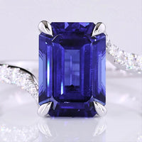 14K White Gold Bypass Ring with 3.59 Carat Emerald Cut Blue Lab Sapphire and 0.24 Carat Round Lab Diamond Accents - Total 3.88 Carats - Covaloro Fine Jewelry
