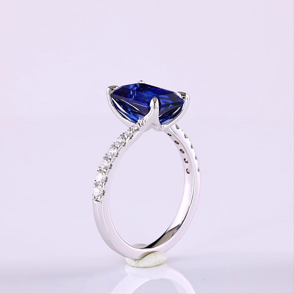 14K White Gold Bypass Ring with 3.59 Carat Emerald Cut Blue Lab Sapphire and 0.24 Carat Round Lab Diamond Accents - Total 3.88 Carats - Covaloro Fine Jewelry