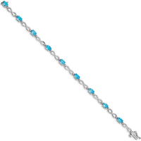 14K White Gold Complete Oval Swiss Blue Topaz and Diamond Infinity Link 7" Bracelet - 0.56 Carats Swiss Blue Topaz, 0.005 Carats Total Diamond Weight by Oro Pregiato