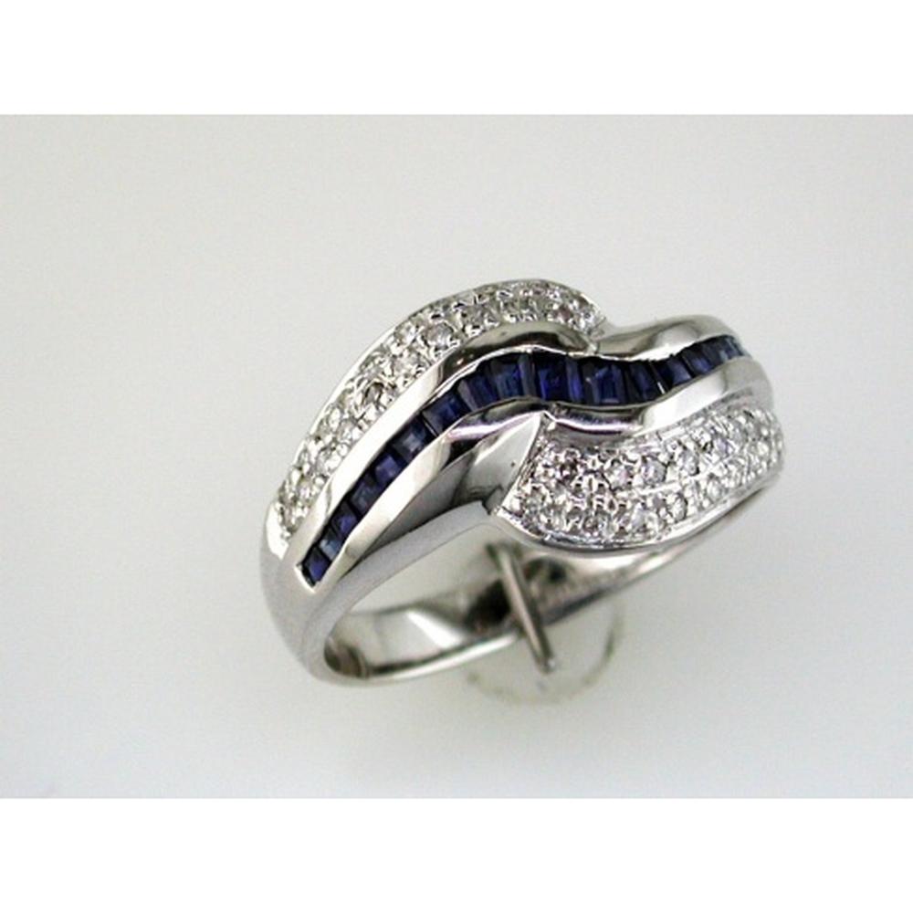 14K White Gold Crossover Ring with 0.88 Carats Baguette Sapphires and 0.21 Carats Round Diamonds