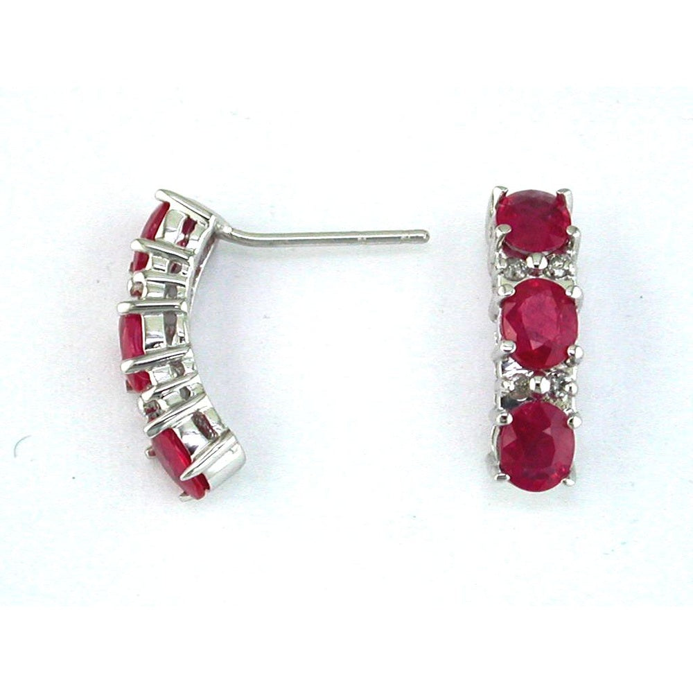 14K White Gold Curved Three-Stone Huggie Earrings with Oval Rubies and Round Diamond Accents - 2.40 Carat Total Ruby Weight and 0.10 Carat Total Diamond Weight - Royal Jewelry