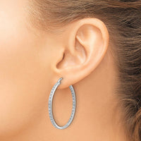 14K White Gold Diamond In/Out Hoop Earrings - 0.018 Carat Total Diamond Weight by Monteluci Fine Jewelry