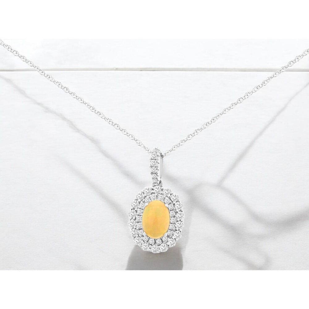 14K White Gold Double Halo Pendant with Oval Opal and Round Diamonds - 0.50 Carat Opal and 0.39 Carat Total Diamond Weight - Royal Jewelry