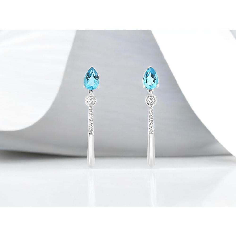 14K White Gold Drop Earrings with Pear Shape Blue Topaz and Diamond Accents - 1.00 Carat Total Blue Topaz Weight and 0.14 Carat Total Diamond Weight - Royal Jewelry