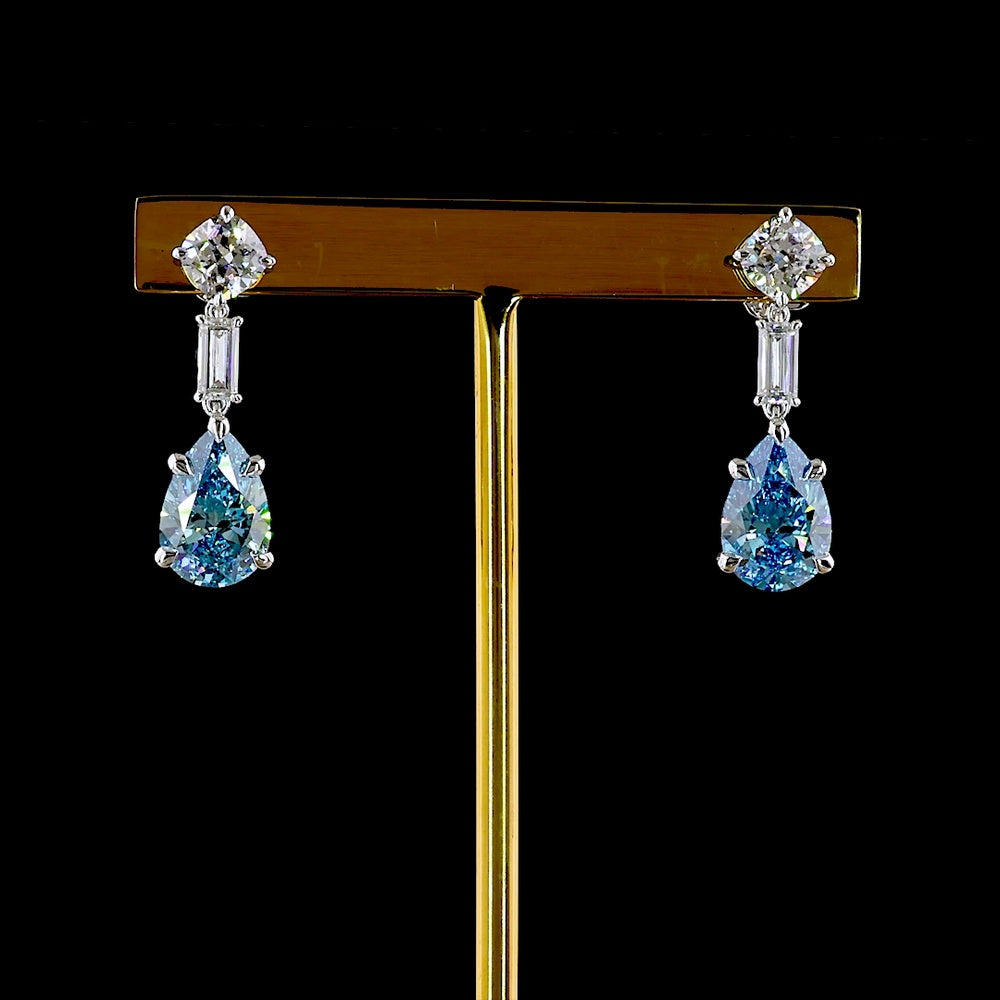 14K White Gold Drop Earrings with Pear-Shaped Fancy Vivid Blue Lab Diamonds and Baguette Accents - 6.56 Carat Total Gem Weight - Covaloro Fine Jewelry