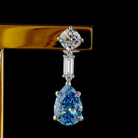 14K White Gold Drop Earrings with Pear-Shaped Fancy Vivid Blue Lab Diamonds and Baguette Accents - 6.56 Carat Total Gem Weight - Covaloro Fine Jewelry