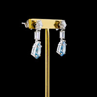 14K White Gold Drop Earrings with Pear-Shaped Fancy Vivid Blue Lab Diamonds and Baguette Accents - 6.56 Carat Total Gem Weight - Covaloro Fine Jewelry
