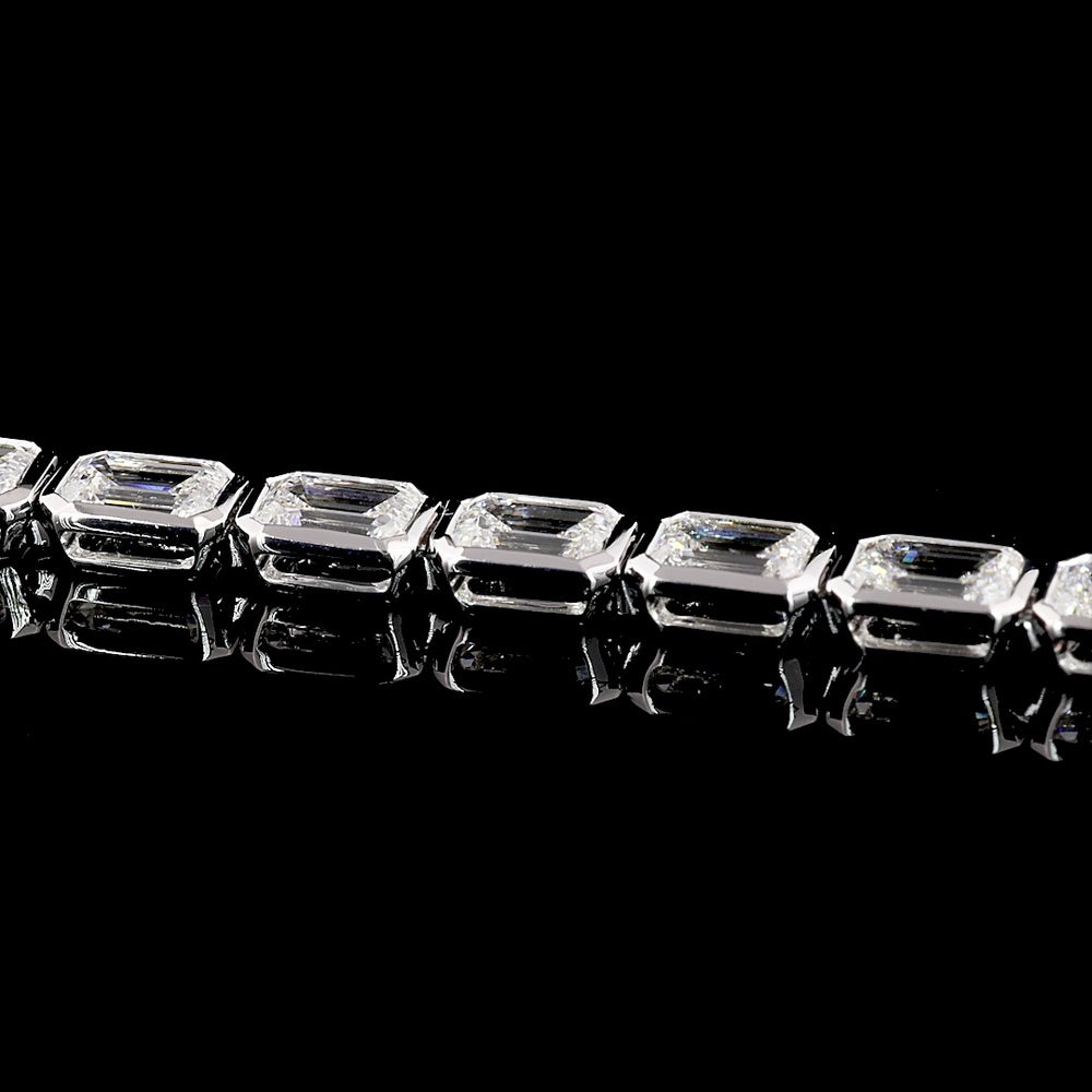 14K White Gold East-West Bezel Set Emerald Cut Lab Diamond Tennis Bracelet - 8.59 Carat Total Weight (D VVS2) - Covaloro Fine Jewelry