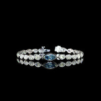 14K White Gold East-West Marquise and Oval Tennis Bracelet with 1.30 Carats Fancy Vivid Blue Lab Diamond and 6.72 Carats Colorless Lab Diamonds - 8.02 Carats Total Weight - Covaloro Fine Jewelry