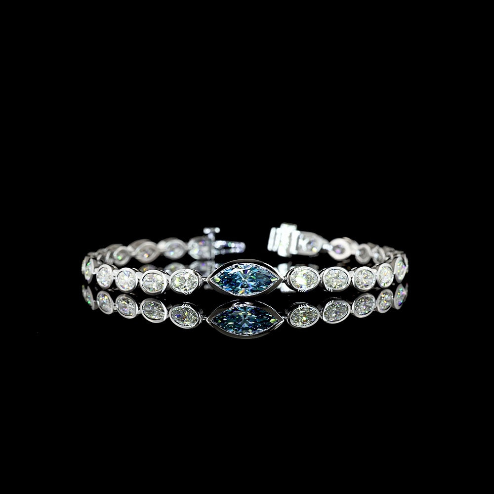 14K White Gold East-West Marquise and Oval Tennis Bracelet with 1.30 Carats Fancy Vivid Blue Lab Diamond and 6.72 Carats Colorless Lab Diamonds - 8.02 Carats Total Weight - Covaloro Fine Jewelry