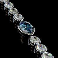 14K White Gold East-West Marquise and Oval Tennis Bracelet with 1.30 Carats Fancy Vivid Blue Lab Diamond and 6.72 Carats Colorless Lab Diamonds - 8.02 Carats Total Weight - Covaloro Fine Jewelry