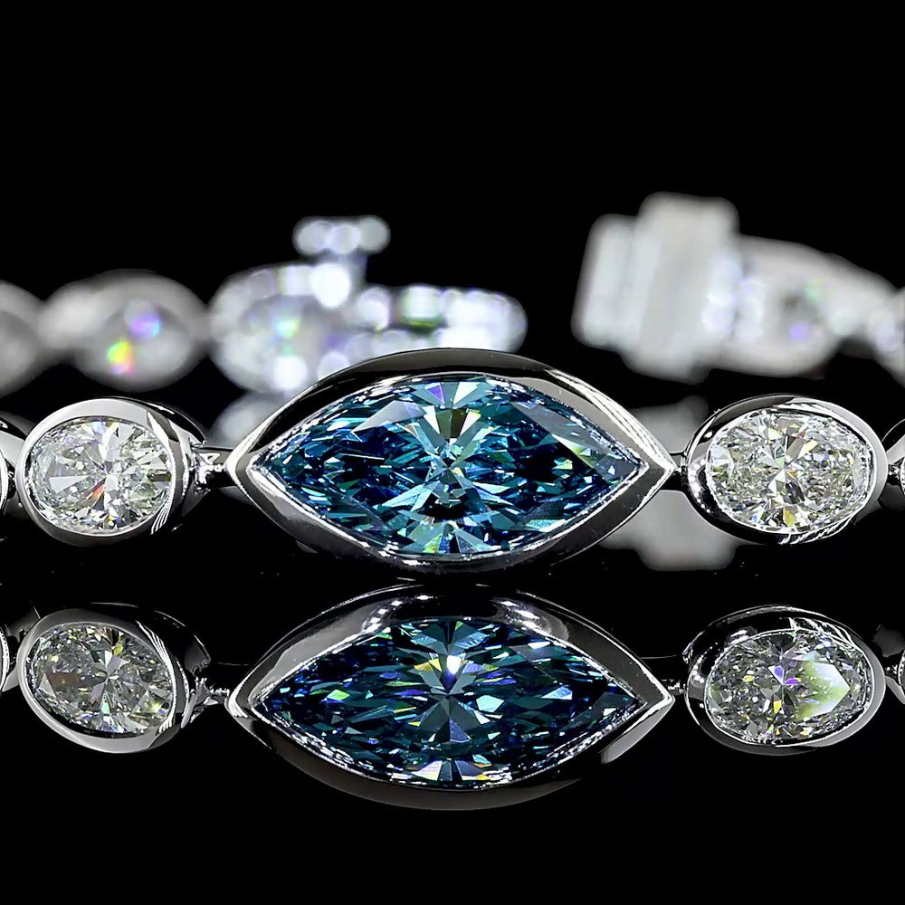 14K White Gold East-West Marquise and Oval Tennis Bracelet with 1.30 Carats Fancy Vivid Blue Lab Diamond and 6.72 Carats Colorless Lab Diamonds - 8.02 Carats Total Weight - Covaloro Fine Jewelry