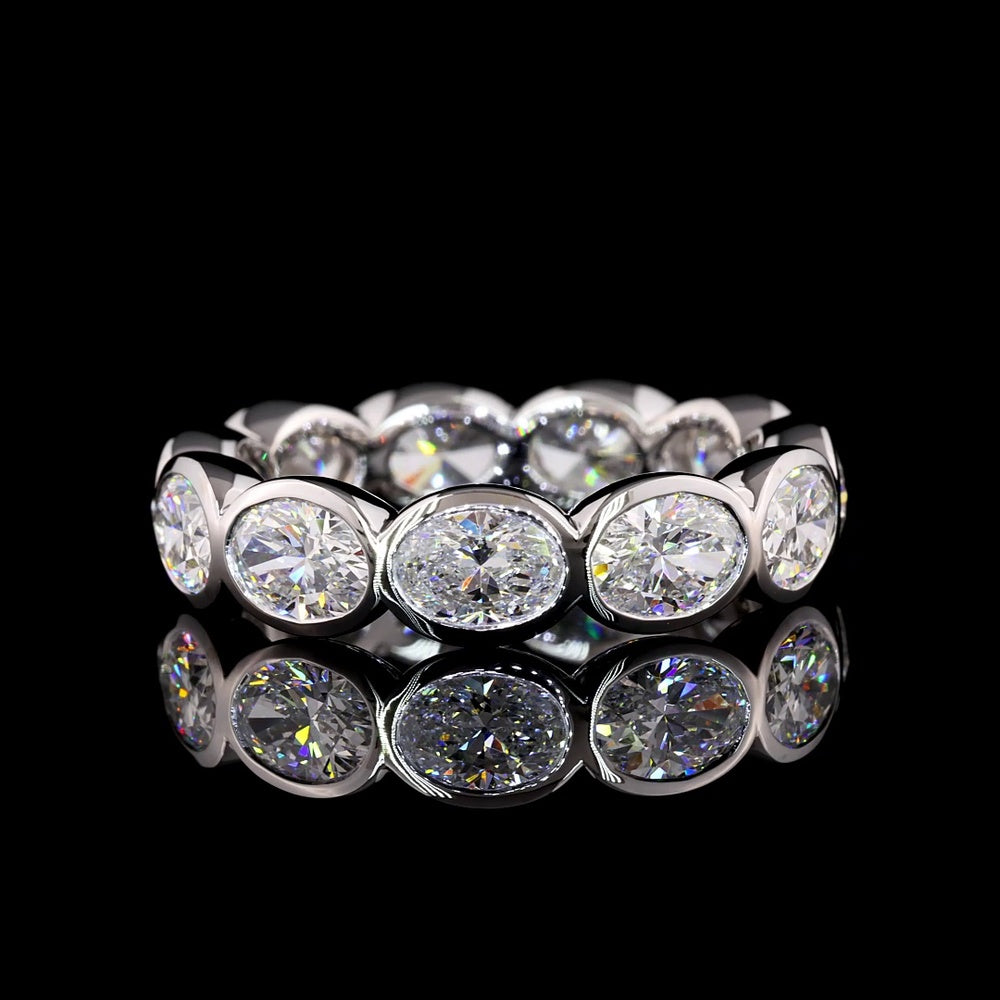 14K White Gold East-West Oval Cut Lab Diamond Eternity Band - 11 Bezel Set Stones, 4.02 Carat Total Weight, E-F VS1 Clarity - Covaloro Fine Jewelry