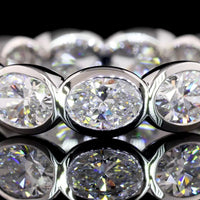 14K White Gold East-West Oval Cut Lab Diamond Eternity Band - 11 Bezel Set Stones, 4.02 Carat Total Weight, E-F VS1 Clarity - Covaloro Fine Jewelry
