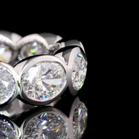 14K White Gold East-West Oval Cut Lab Diamond Eternity Band - 11 Bezel Set Stones, 4.02 Carat Total Weight, E-F VS1 Clarity - Covaloro Fine Jewelry