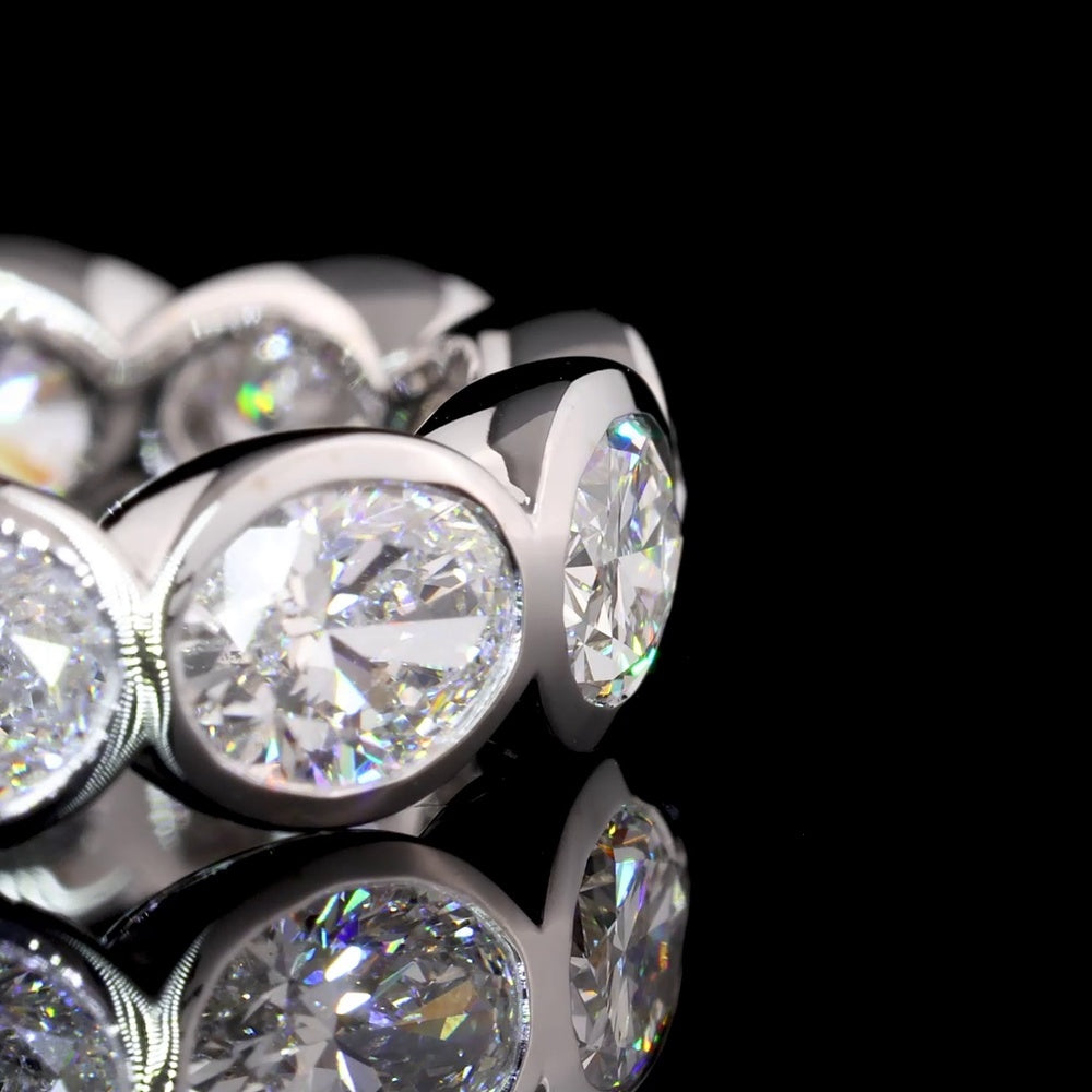 14K White Gold East-West Oval Cut Lab Diamond Eternity Band - 11 Bezel Set Stones, 4.02 Carat Total Weight, E-F VS1 Clarity - Covaloro Fine Jewelry