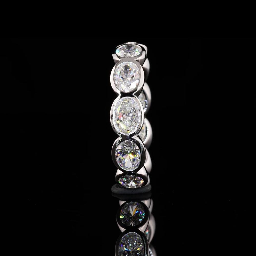 14K White Gold East-West Oval Cut Lab Diamond Eternity Band - 11 Bezel Set Stones, 4.02 Carat Total Weight, E-F VS1 Clarity - Covaloro Fine Jewelry