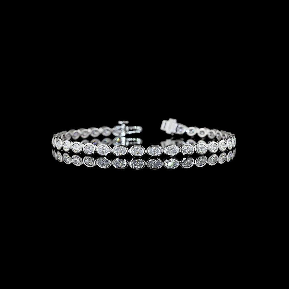 14K White Gold East-West Oval Cut Lab Diamond Tennis Bracelet with Bezel Setting - 4.08 Carat Total Diamond Weight (E-F Color, VS Clarity) - Covaloro Fine Jewelry