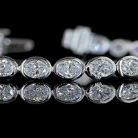 14K White Gold East-West Oval Cut Lab Diamond Tennis Bracelet with Bezel Setting - 4.08 Carat Total Diamond Weight (E-F Color, VS Clarity) - Covaloro Fine Jewelry
