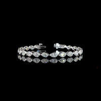 14K White Gold East-West Pear Shape Tennis Bracelet with Bezel Set Lab Diamonds - 7.65 Carat Total Weight (E-F Color, VS Clarity) - Covaloro Fine Jewelry