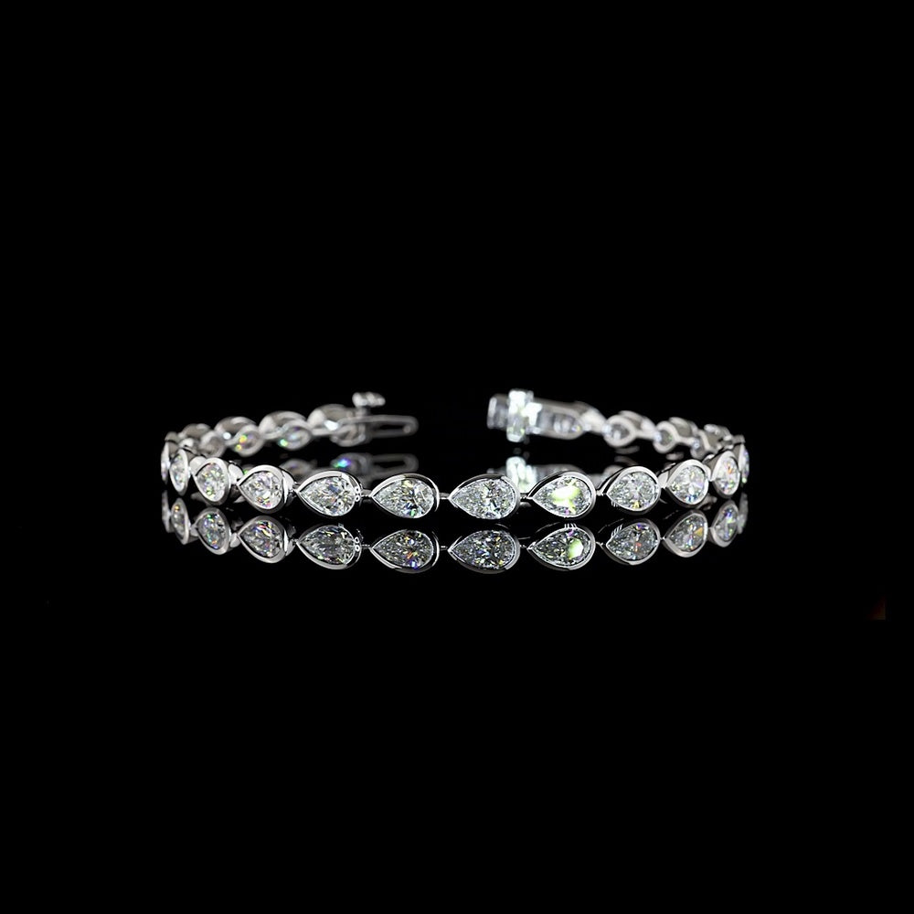 14K White Gold East-West Pear Shape Tennis Bracelet with Bezel Set Lab Diamonds - 7.65 Carat Total Weight (E-F Color, VS Clarity) - Covaloro Fine Jewelry