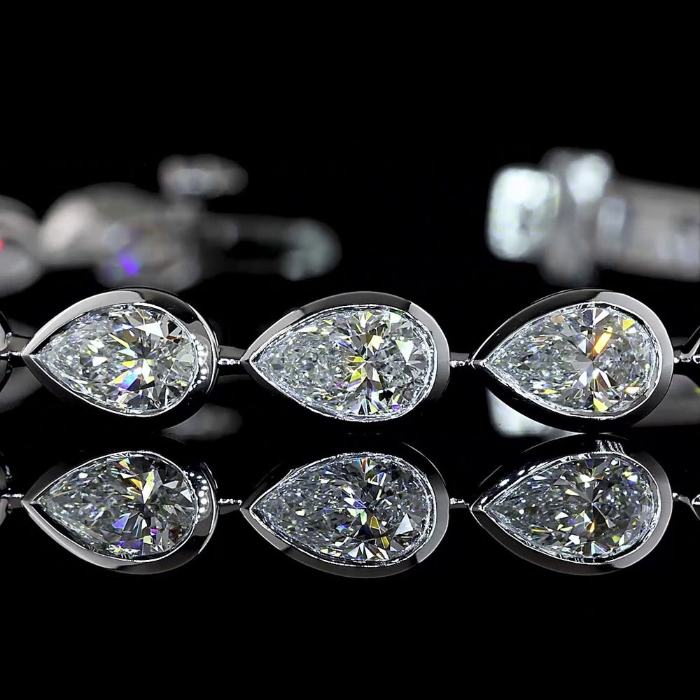 14K White Gold East-West Pear Shape Tennis Bracelet with Bezel Set Lab Diamonds - 7.65 Carat Total Weight (E-F Color, VS Clarity) - Covaloro Fine Jewelry