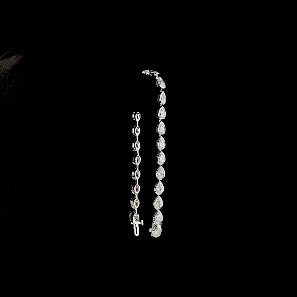 14K White Gold East-West Pear Shape Tennis Bracelet with Bezel Set Lab Diamonds - 7.65 Carat Total Weight (E-F Color, VS Clarity) - Covaloro Fine Jewelry