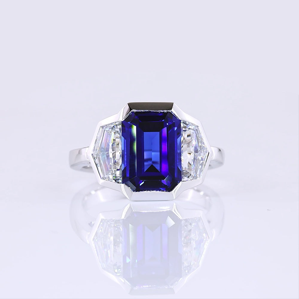 14K White Gold Emerald Cut Three-Stone Ring with 4.73 Carats Blue Lab Gemstone and 1.54 Carats Cadillac-Cut Lab Diamonds - 6.27 Carats Total Carat Weight - Covaloro Fine Jewelry