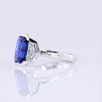 14K White Gold Emerald Cut Three-Stone Ring with 4.73 Carats Blue Lab Gemstone and 1.54 Carats Cadillac-Cut Lab Diamonds - 6.27 Carats Total Carat Weight - Covaloro Fine Jewelry