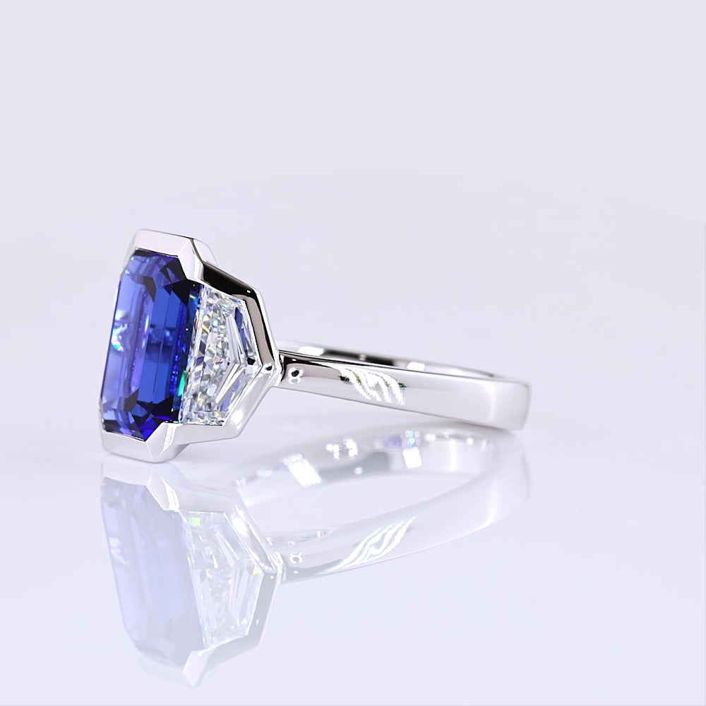 14K White Gold Emerald Cut Three-Stone Ring with 4.73 Carats Blue Lab Gemstone and 1.54 Carats Cadillac-Cut Lab Diamonds - 6.27 Carats Total Carat Weight - Covaloro Fine Jewelry