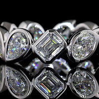 14K White Gold Eternity Band with Alternating Emerald Cut, Pear Shape, and Oval Cut Lab Diamonds in Bezel Settings - 2.62 Carat Total Diamond Weight - Covaloro Fine Jewelry
