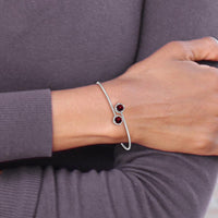14K White Gold Flexible Bangle Bracelet with Round Garnets and Diamond Halo - 0.63 Carats Total Garnet Weight, 0.005 Carats Diamond Weight by Monteluci Fine Jewelry