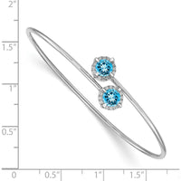 14K White Gold Flexible Bangle Bracelet with Round Swiss Blue Topaz and Diamond Halo - 0.6 Carats Blue Topaz, 0.12 Carats Total Diamond Weight by Monteluci Fine Jewelry