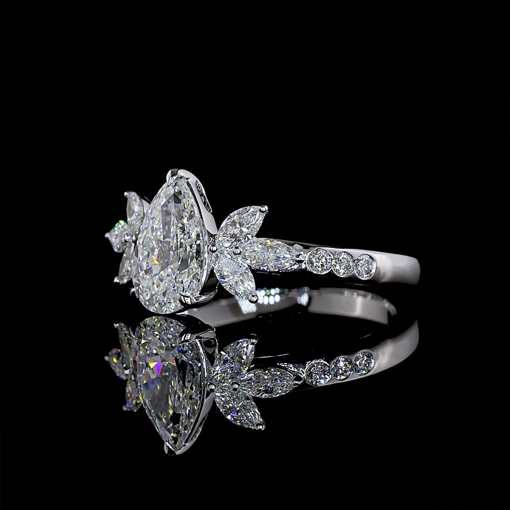 14K White Gold Floral-Inspired Pear Shape Diamond Ring with Marquise and Round Side Stones - 1.41 Carats Total Diamond Weight (1.00 Carats Center D VVS2 Lab Diamond) - Covaloro Fine Jewelry