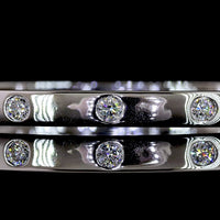 14K White Gold Flush-Set Lab Diamond Bangle with 7 Round Brilliant Cut Stones - 0.79 Carat Total Diamond Weight, E-F Color, VS1 Clarity - Covaloro Fine Jewelry