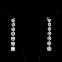 14K White Gold Graduated Drop Earrings with Round Brilliant Cut Lab Diamonds - 4.41 Carat Total Weight, E-F Color VS Clarity - Covaloro Fine Jewelry