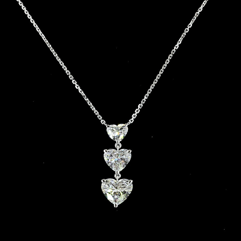 14K White Gold Graduated Three-Stone Heart Shaped Lab Diamond Pendant - 2.99 Carat Total Weight, E-VS1 Clarity - Covaloro Fine Jewelry