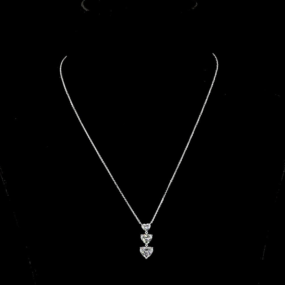 14K White Gold Graduated Three-Stone Heart Shaped Lab Diamond Pendant - 2.99 Carat Total Weight, E-VS1 Clarity - Covaloro Fine Jewelry