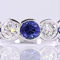 14K White Gold Half Eternity Band with Alternating Round Lab Blue and White Gemstones in Half Bezel Settings - 1.07 Total Carat Weight - Covaloro Fine Jewelry