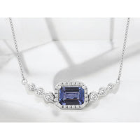 14K White Gold Halo Necklace with Emerald Cut Tanzanite and Round Diamonds - 1.15 Carat Tanzanite, 0.25 Carat Total Diamond Weight - Royal Jewelry