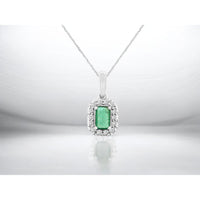 14K White Gold Halo Pendant Necklace with Emerald-Cut Emerald and Round Diamond Accents - 0.28 Carat Emerald and 0.10 Carat Total Diamond Weight - Royal Jewelry