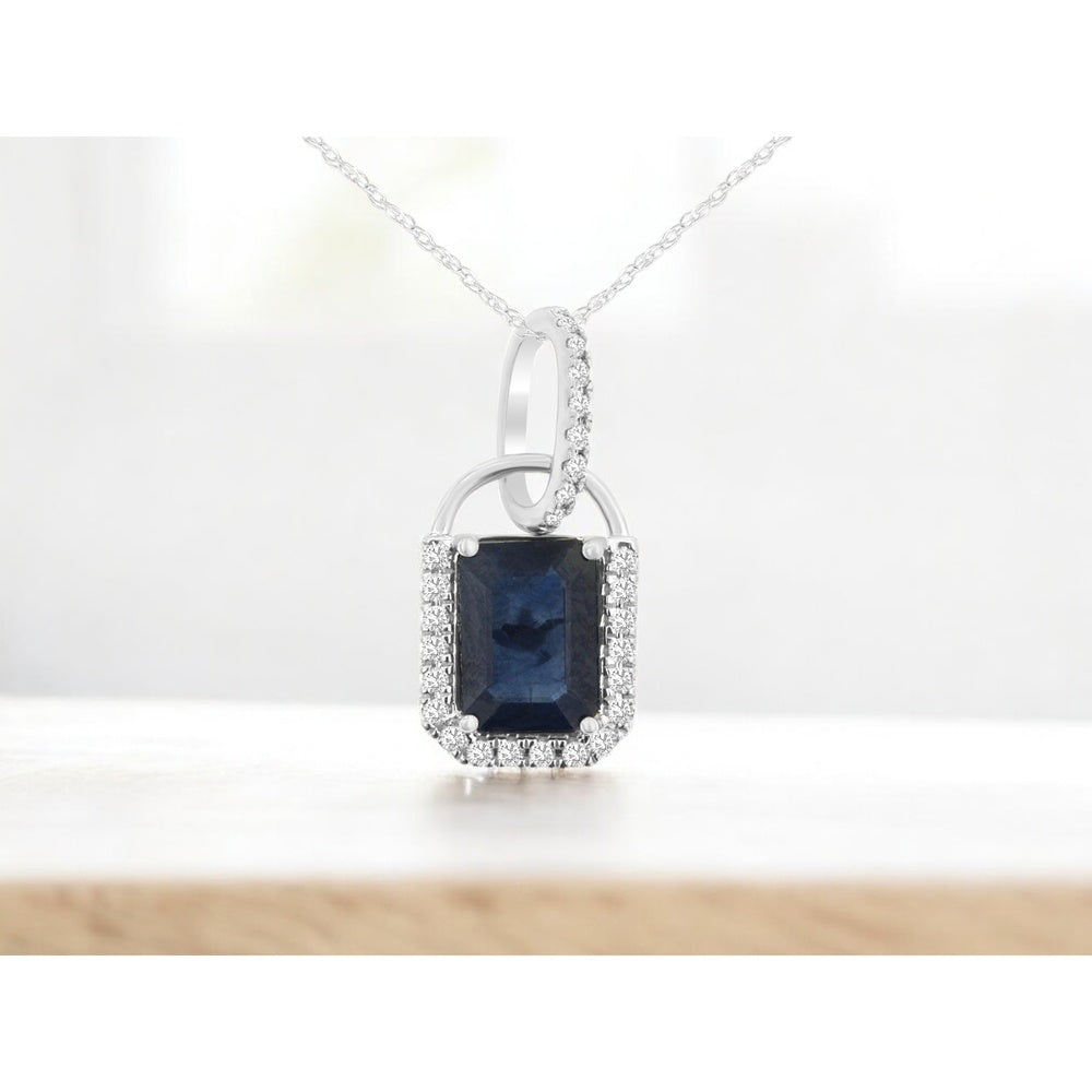 14K White Gold Halo Pendant Necklace with Emerald Cut Sapphire and Round Diamond Accents - 1.08 Carat Sapphire and 0.10 Carat Total Diamond Weight - Royal Jewelry