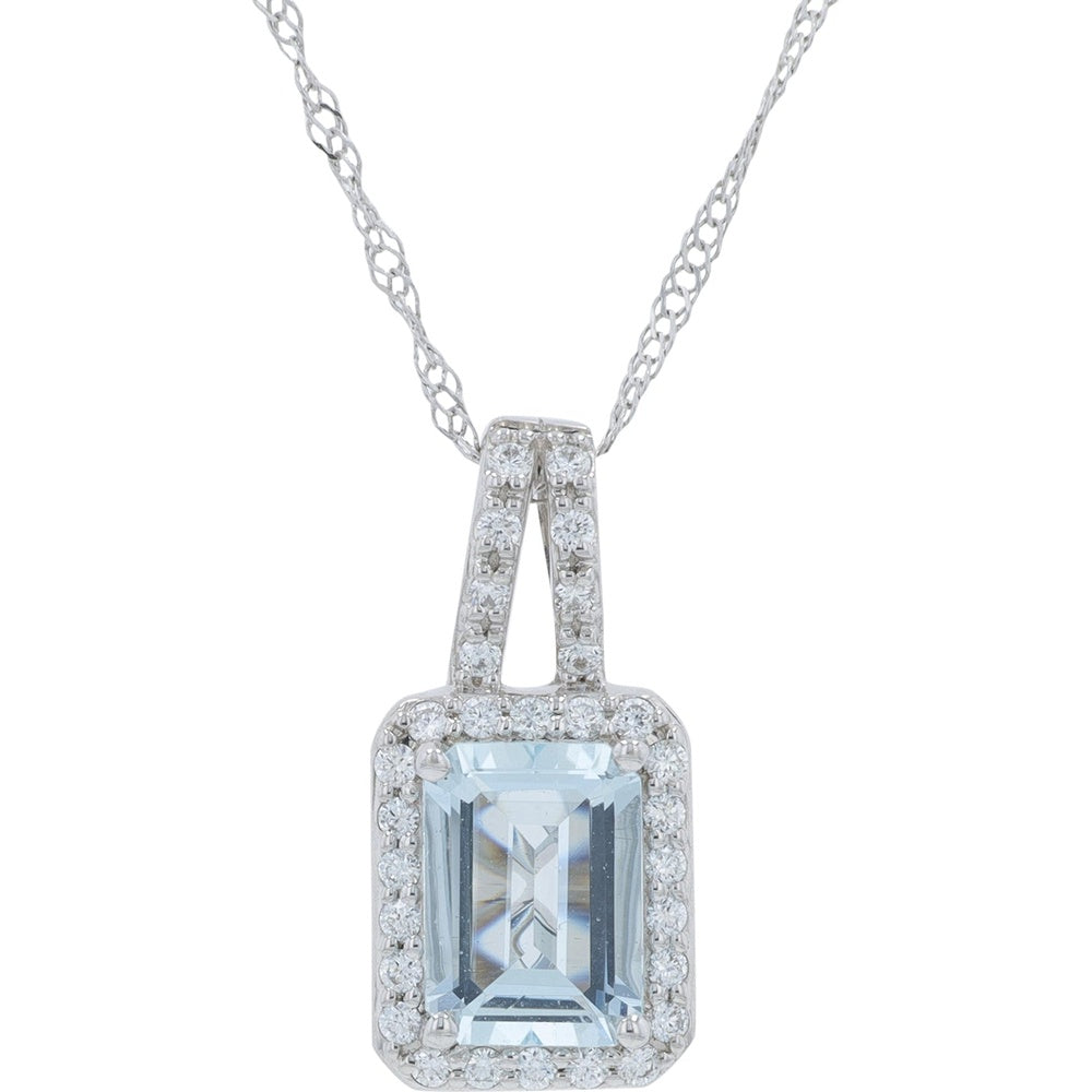 14K White Gold Halo Pendant with Emerald-Cut Aquamarine and 0.12 Carat Total Weight Round Brilliant Diamonds on an 18-Inch Chain