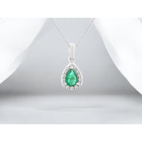 14K White Gold Halo Pendant with Pear-Shaped Emerald and Round Diamonds - 0.38 Carat Emerald and 0.12 Carat Total Diamond Weight - Royal Jewelry