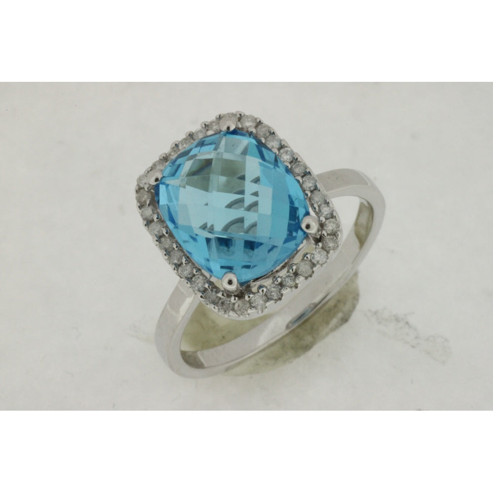 14K White Gold Halo Ring with 4.85 Carat Cushion-Cut Blue Topaz and 0.18 Carat Round Diamond Accents - Royal Jewelry
