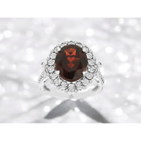 14K White Gold Halo Ring with 5.50 Carat Oval Garnet and 0.25 Carat Round Diamond Accents - Royal Jewelry