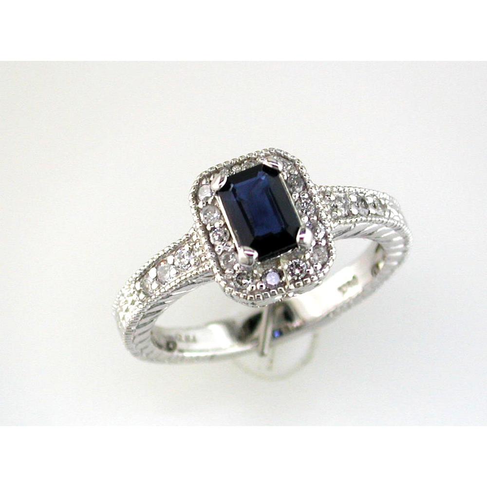 14K White Gold Halo Ring with Emerald Cut Sapphire and Round Diamonds - 0.70 Carat Sapphire and 0.30 Carat Total Diamond Weight - Royal Jewelry